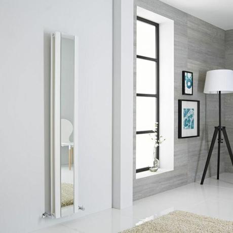 Milano Icon white radiator on a gray wall next to a window