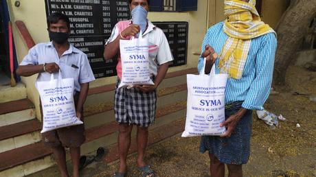 SYMA members organise rice distribution