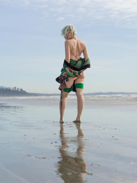Lingerie photo shoot. Silk on the beach.