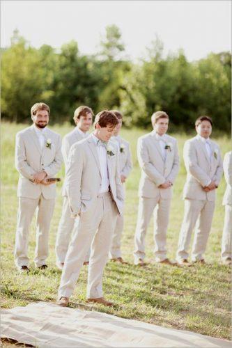 groomsmen photos they look to the bride glass jar photography