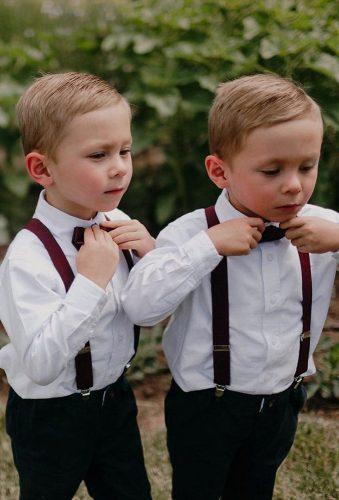 groomsmen photos two boys with butterfly lyonsfarmette