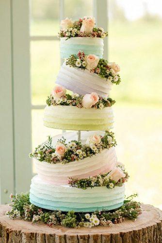 buttercream wedding cakes colorful ombbre tall cake decorated with roses katelyn james photography