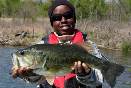 Person holding a large bass