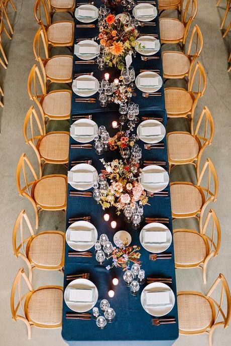 wedding colors classic blue long table with flowers meg smith photography