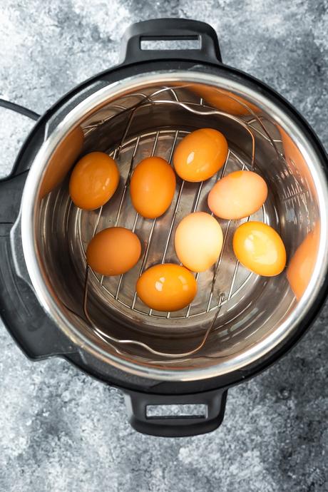 overhead view of eggs on the trivet in an instant pot