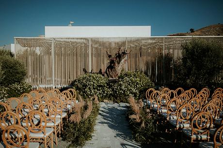 Rustic summer wedding in Nicosia with string lights and flowers in vivid colors | Joy & Pierre