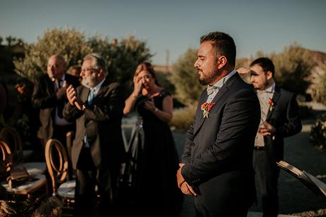 Rustic summer wedding in Nicosia with string lights and flowers in vivid colors | Joy & Pierre