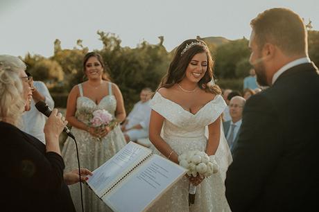 Rustic summer wedding in Nicosia with string lights and flowers in vivid colors | Joy & Pierre