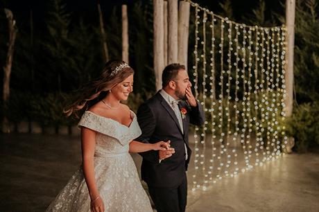 Rustic summer wedding in Nicosia with string lights and flowers in vivid colors | Joy & Pierre