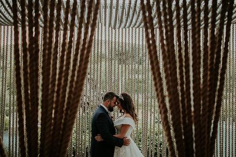 Rustic summer wedding in Nicosia with string lights and flowers in vivid colors | Joy & Pierre