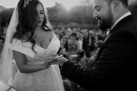 Rustic summer wedding in Nicosia with string lights and flowers in vivid colors | Joy & Pierre