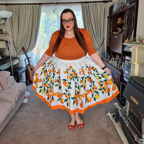 Pin Up Girl Clothing Orange print skirt