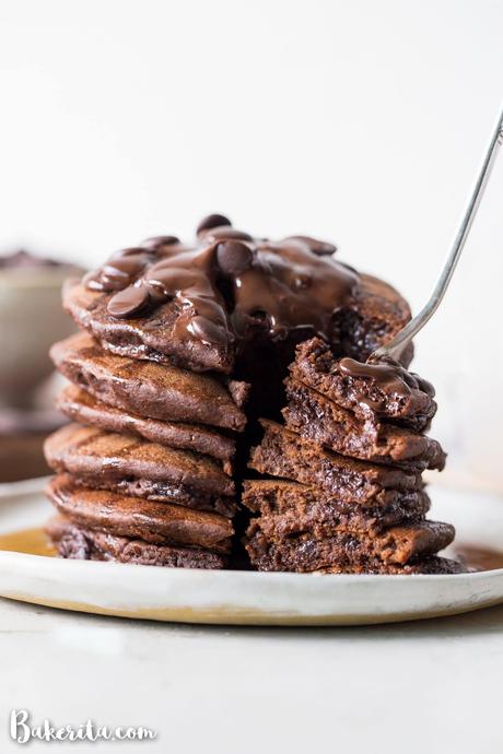 These Gluten-Free Vegan Double Chocolate Pancakes are a deliciously fluffy and decadent breakfast! Made with rolled oats and loaded with chocolate chips.