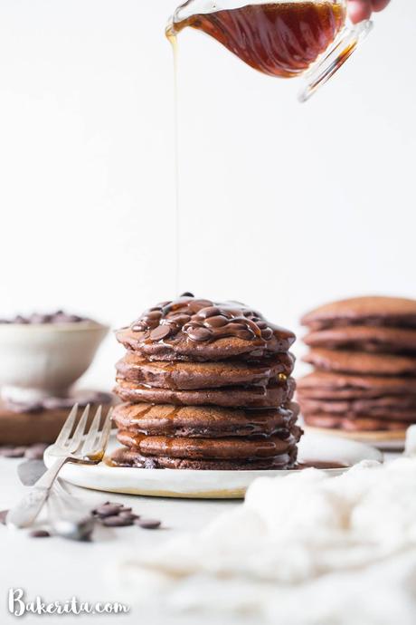 These Gluten-Free Vegan Double Chocolate Pancakes are a deliciously fluffy and decadent breakfast! Made with rolled oats and loaded with chocolate chips.