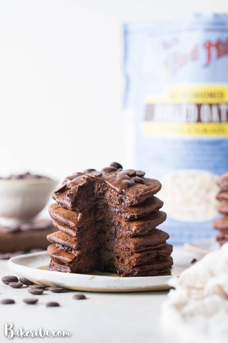 These Gluten-Free Vegan Double Chocolate Pancakes are a deliciously fluffy and decadent breakfast! Made with rolled oats and loaded with chocolate chips.