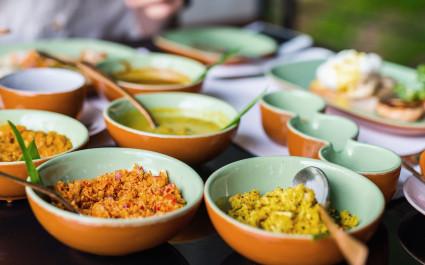 Coconut sambal and curry close up on table with Sri Lankan food, Asia