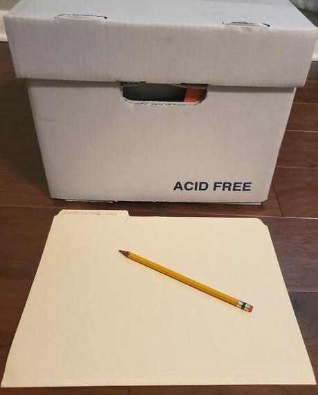 Acid free box, folder, and pencil