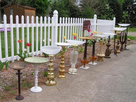 Lamp birdbaths lined up before going to the craft fair!