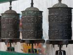 Prayer wheels located around the Kathesimbhu Stupa
