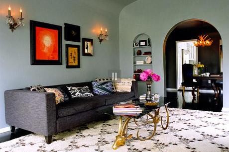 Kishani Perera living room, moroccan rug, ikat pillow, gray couch, rams head table