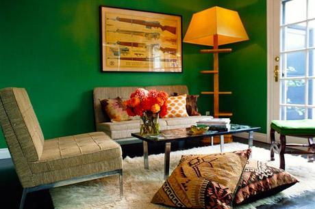 Kishani Perera sitting room, green walls, flokati rug, kilim pillows