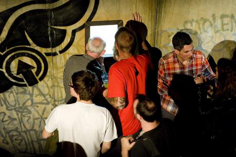 Guests looking at drones working at the DFace Smirnoff event east London Follow up: D*Face x Smirnoff event at Wiltons Music Hall