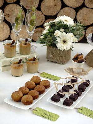 A Dessert Table with Beautiful Natural Earthy Tones and fantastic wooden log backdrop By That Cute Little Cake