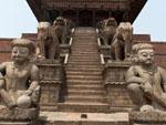 The stairway leading up to Nyatapola Temple is flanked by guardian figures at each plinth level