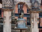 Smaller bell on the Vatsala Durga Temple's plinth, popularly known as the barking bell