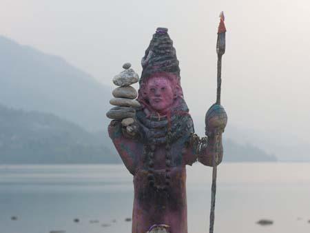 A religious deity on the banks of Lake Phewa Tal