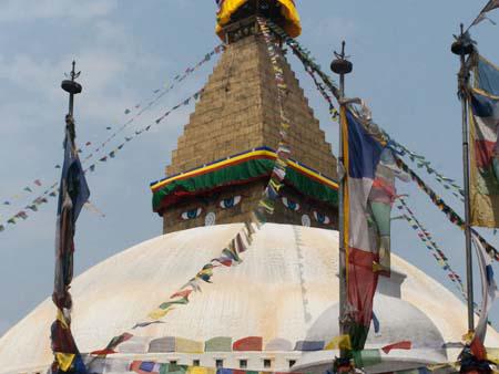 The Bodhnath Stupa surrounded by Buddhist prayer flags