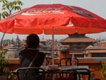 Sonya enjoying a cold drink and the view of Durbar Square