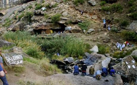 fertility cave caves africa men praying