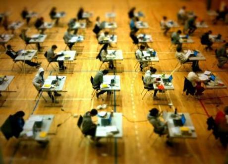 Pupils sitting an exam - GCSES are to be scrapped, under new propositions