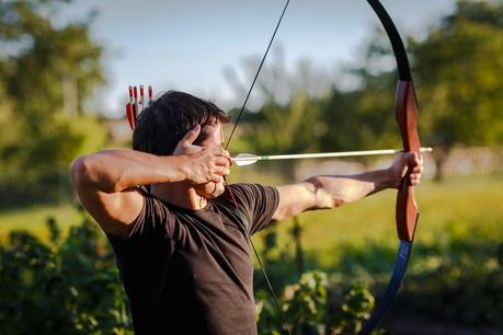 Shooting a bow and arrow