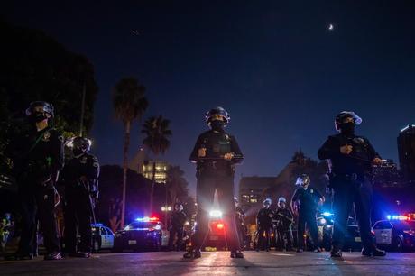 Clashes between police and protesters harden beyond Portland