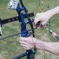 Putting Arrow On Compound Bow