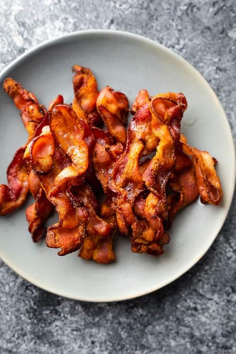 plate with air fried bacon on it