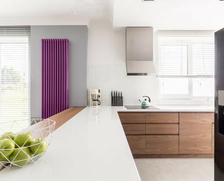 Purple radiator in large kitchen space
