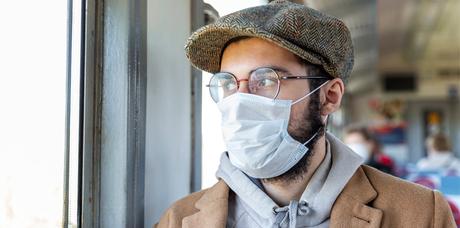 man with face mask and glasses