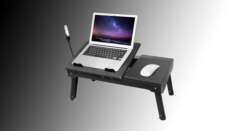 This $38 laptop stand has a built-in reading lamp, cooling fan and USB hub