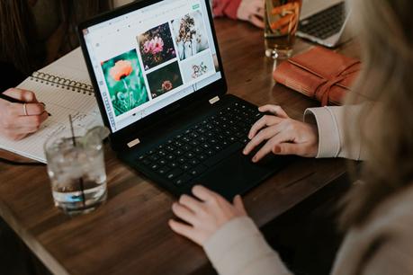 woman viewing photos in computer