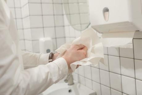 man-wiping-hands-with-paper-towel