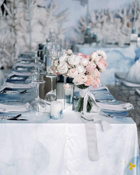 spring wedding colors powder blue peach table scape
