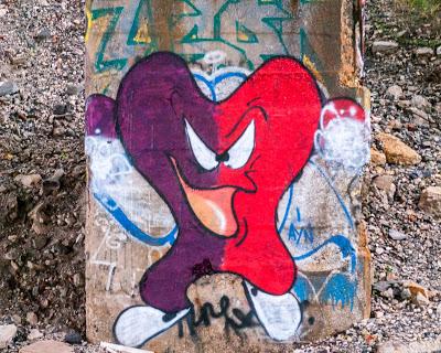 If you had to say that one was male, the other female, which is which? [graffiti in the wild]