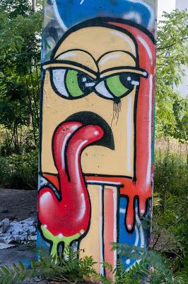 If you had to say that one was male, the other female, which is which? [graffiti in the wild]