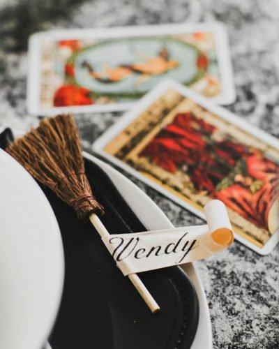halloween bridal shower ideas placesetting broom with name celebrationsathome