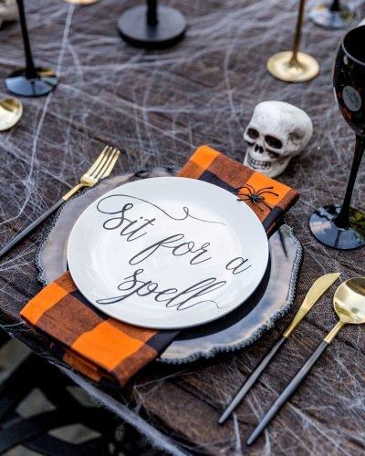 halloween bridal shower ideas place setting with skull and spider pizzazzerie