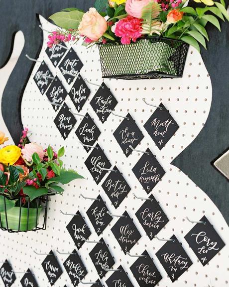 black white wedding colors seatting chart flowers