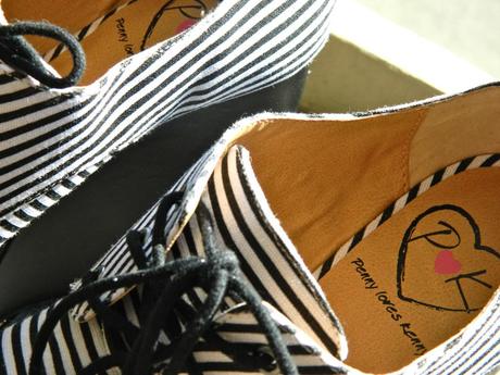 http://www.lulus.com/products/penny-loves-kenny-niley-black-and-white-striped-oxford-platforms/52429.html
